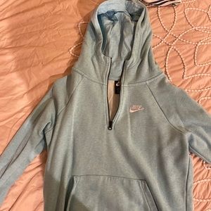 Light Blue Nike Quarter Zip hoodie.